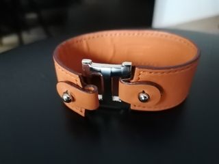 Pulsera ancha Hermès naranja y plata