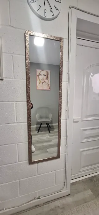 Espejo de pared dorado metalizado