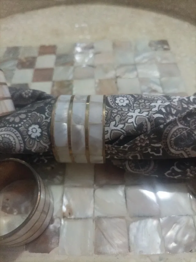 Porta servilletas dorado y piedra