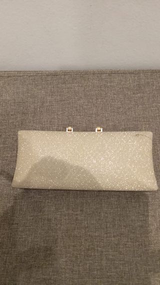 Bolso de mano dorado con brillos clutch