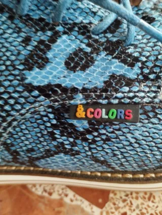 Zapatos de cordones con estampado de serpiente