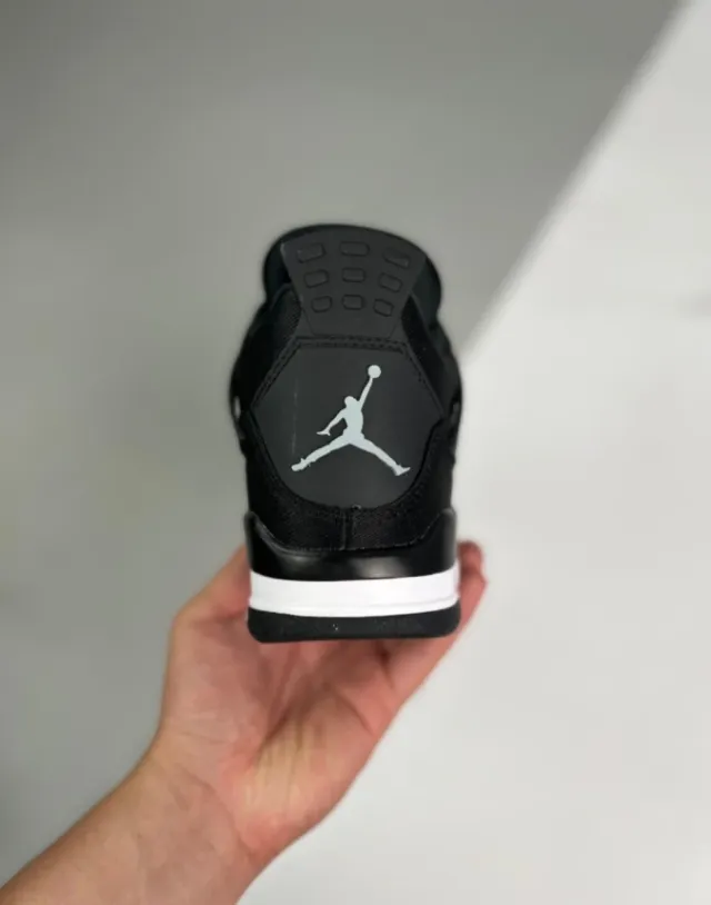 Air Jordan 4 Retro Black Canvas.