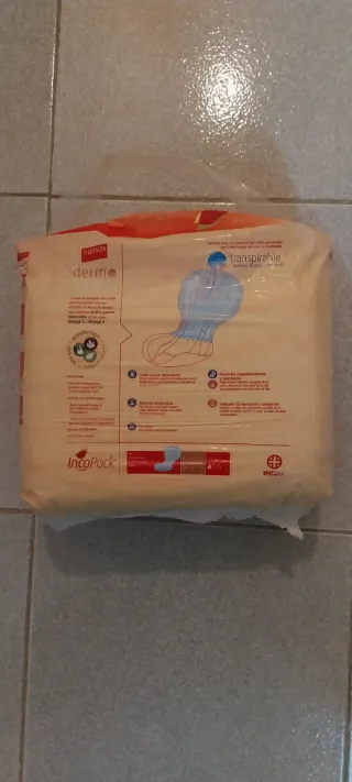 Empapadores para cama gris y blanco