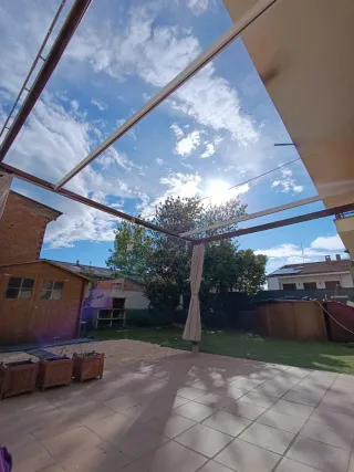 Pérgola con toldo