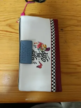 Cartera Nikky multicolor con diseño de jeans