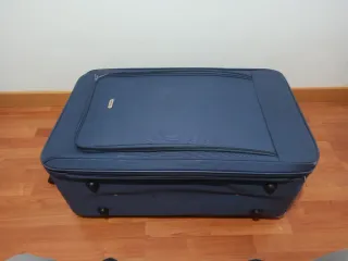 Maleta grande azul con ruedas