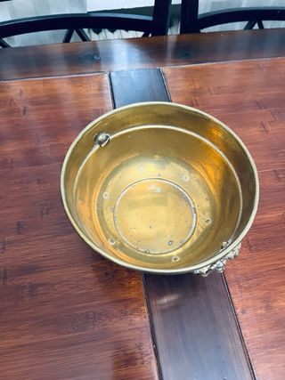 Centro de mesa de cobre con leones