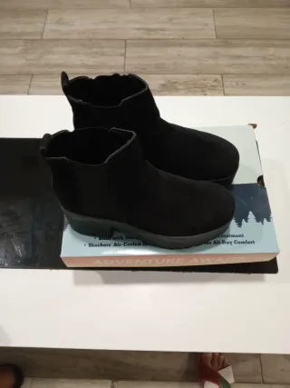 Botines negros Skechers