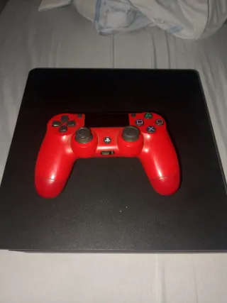 PS4 da 1 TB + controller rosso