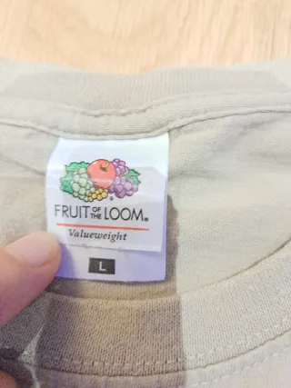 Camiseta beige con dibujo animado