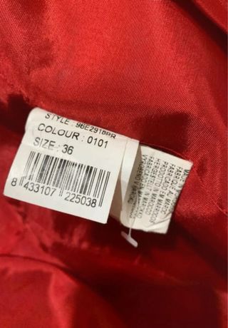 Abrigo desigual botones fantasía