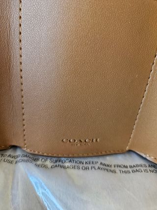Cartera Coach Flores Blanco y Negro