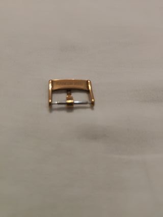 Fibbia Omega Oro