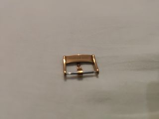 Fibbia Omega Oro