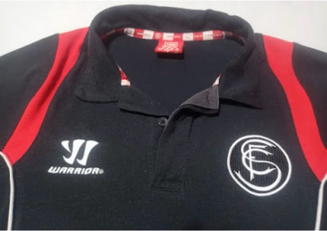 Polo Sevilla FC Warrior Negro y Rojo,