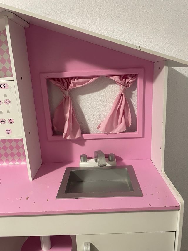 Cocina de juguete rosa