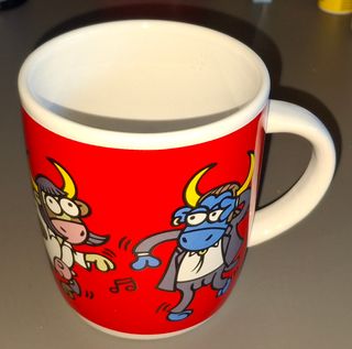 Taza Kukuxumusu Pulp Fiction Travolta Vacas