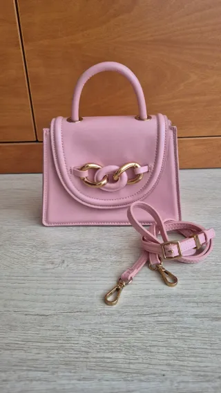 Bolso mini Zara rosa con cadena dorada