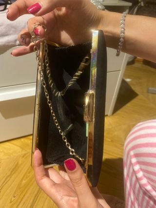 Bolso de fiesta negro y dorado