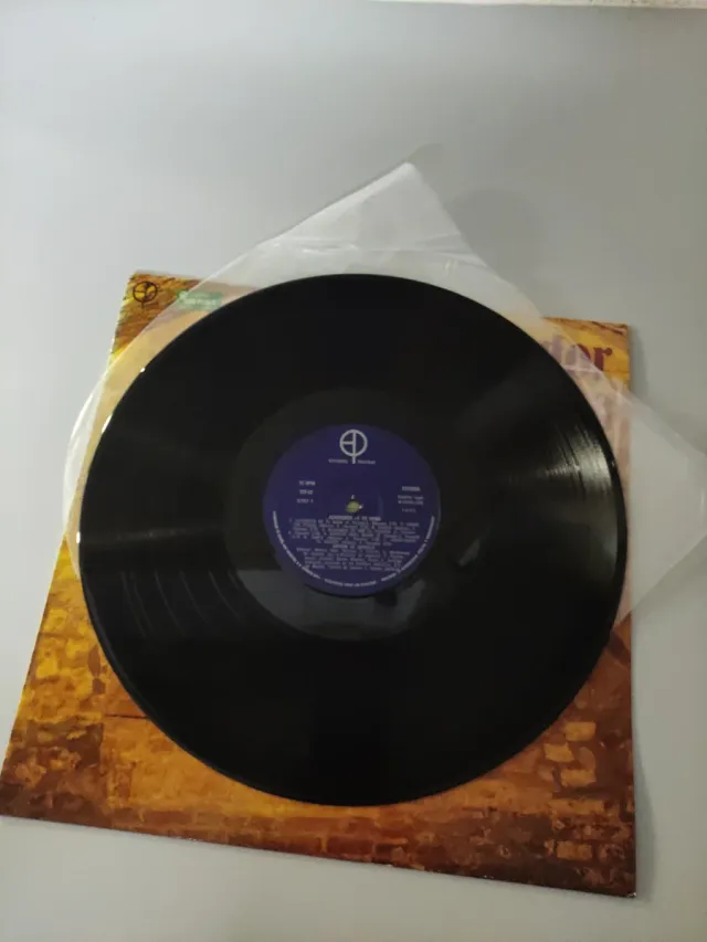 Vinilo Alrededor de tu mesa