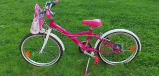 Bicicleta niña 20 Btwin rosa cesta