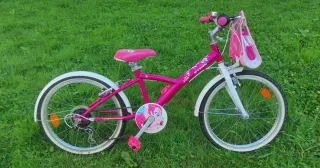 Bicicleta niña 20 Btwin rosa cesta