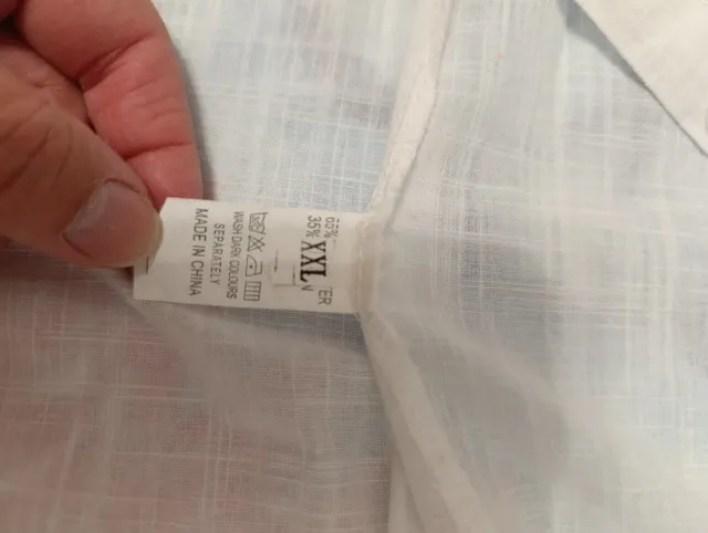 Camisa blanca manga larga con estampado floral