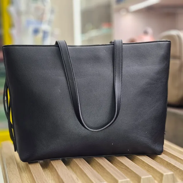 Borsa Love Moschino con frange e borchie