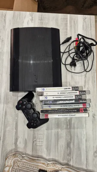 Consola PlayStation 3 con juegos y mando