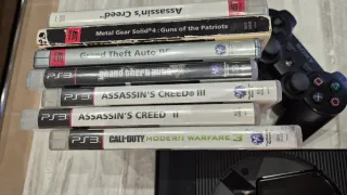 Consola PlayStation 3 con juegos y mando