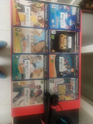 Pacchetto giochi Singstar PS2 + microfoni