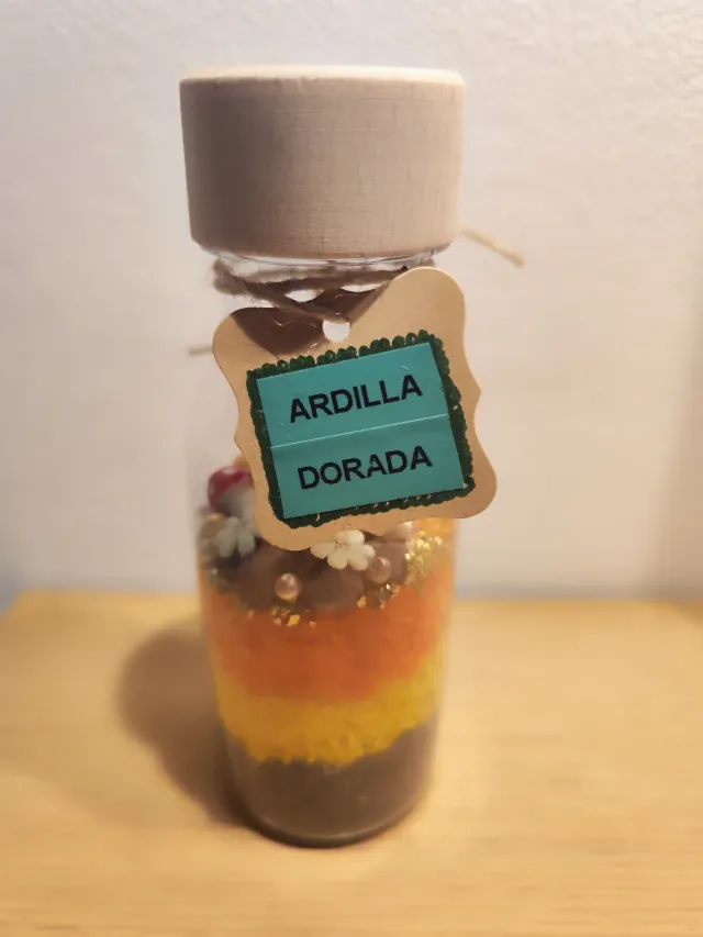 Botella sensorial Ardilla Dorada