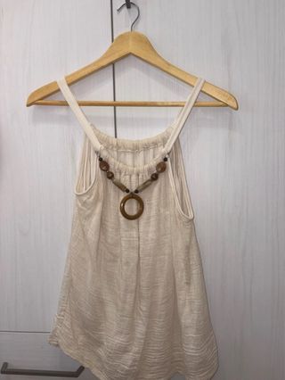 Camiseta sin mangas con collar