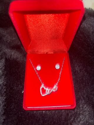 Conjunto de plata con corazones