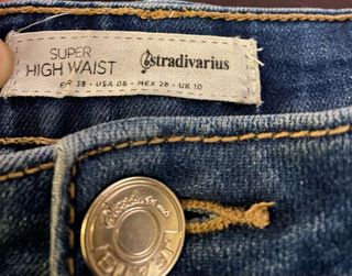 Pantalón vaquero talle alto desgastado