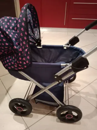 Cochecito de muñecas azul