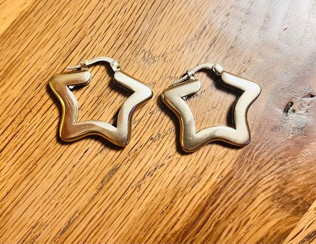 Orecchini con stella Thun