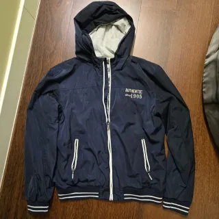 Chaqueta chubasquero American Rebel azul. 14 años