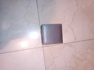 Reloj elegante dorado y plateado con caja original