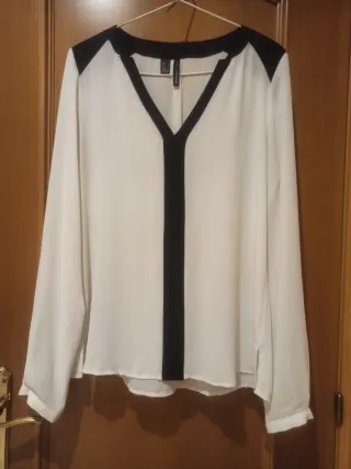 Camisa blanca y negra