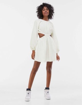Vestido blanco corto con aberturas
