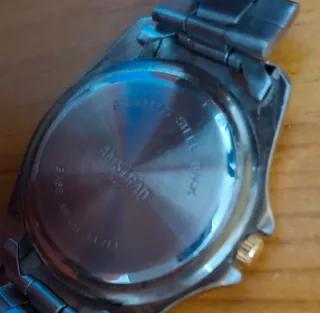 Reloj Amstrad Quartz Vintage Dorado y Plateado