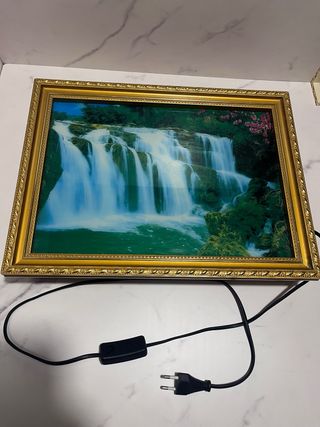 Quadro cascate in movimento con luce