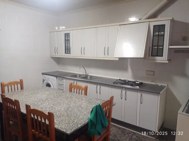 Casa adosada con patio , cochera , almacen