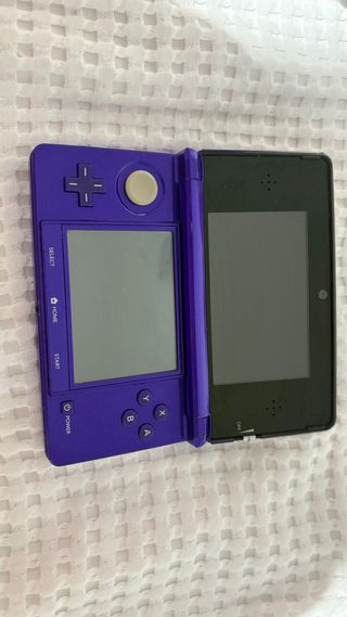 Nintendo 3DS viola + caricabatterie originale