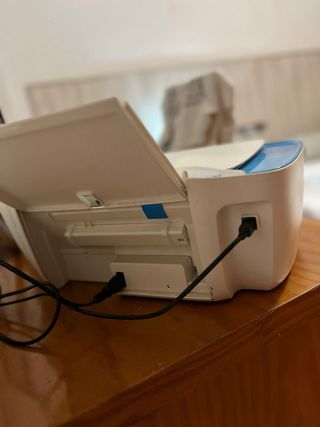 Impresora HP Azul y Blanca