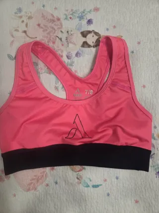 Top deportivo Axel rosa talla 7/8. Nuevo a estrena