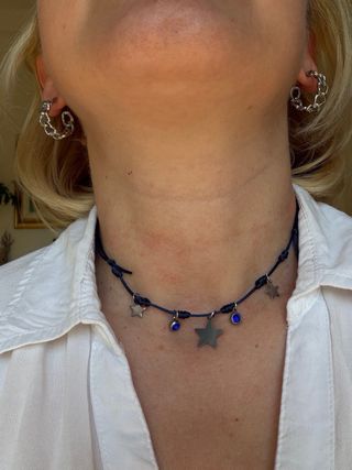 Collana con stelle in acciaio e cristalli blu