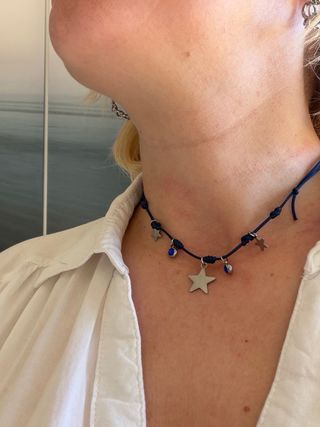 Collana con stelle in acciaio e cristalli blu