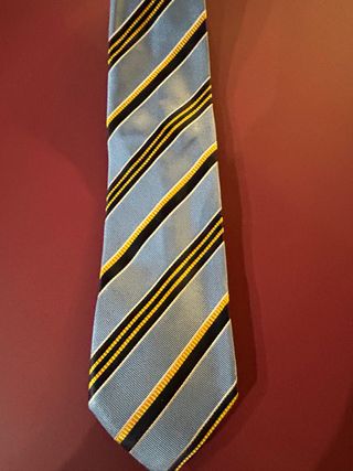 Corbata de rayas azul y oro